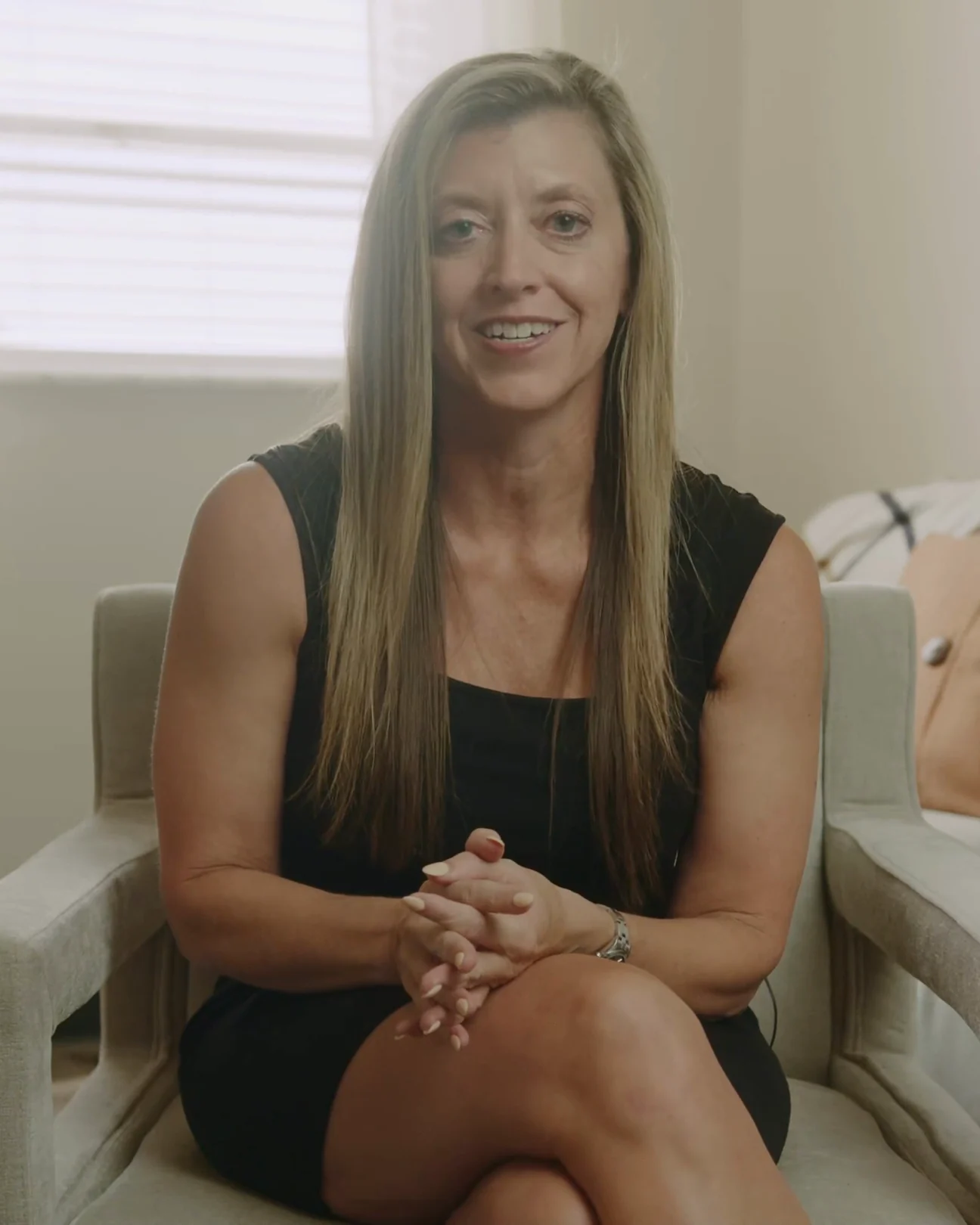 Sara Loftis, founder of Midwest Behavioral Health and Wellness, seated in the practice